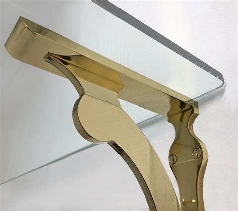 modern brass shelf brackets